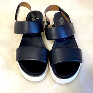 Black leather with Velcro strap